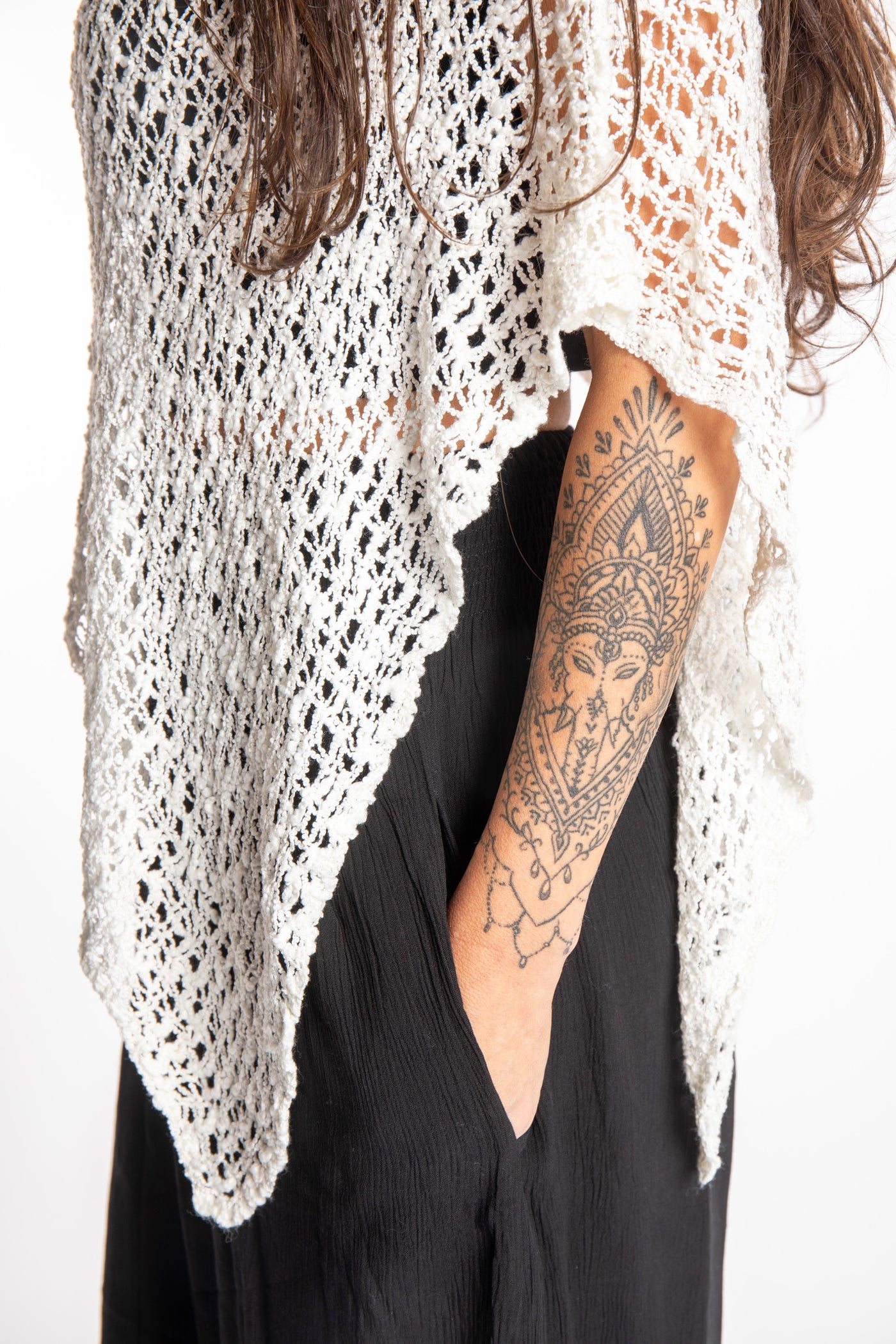 Jen is wearing the Ivory loose weave shawl