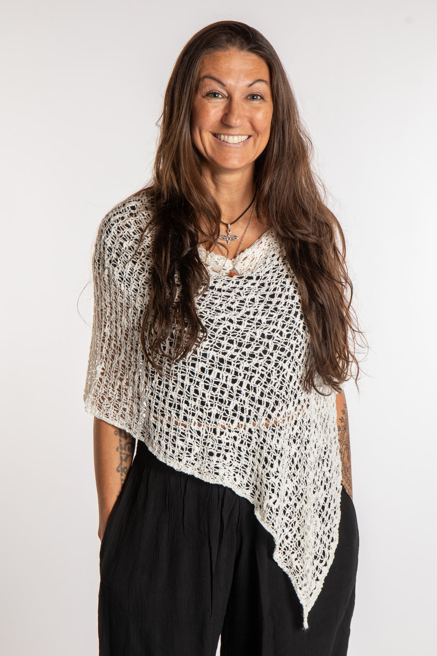 Jen is wearing the Ivory loose weave shawl