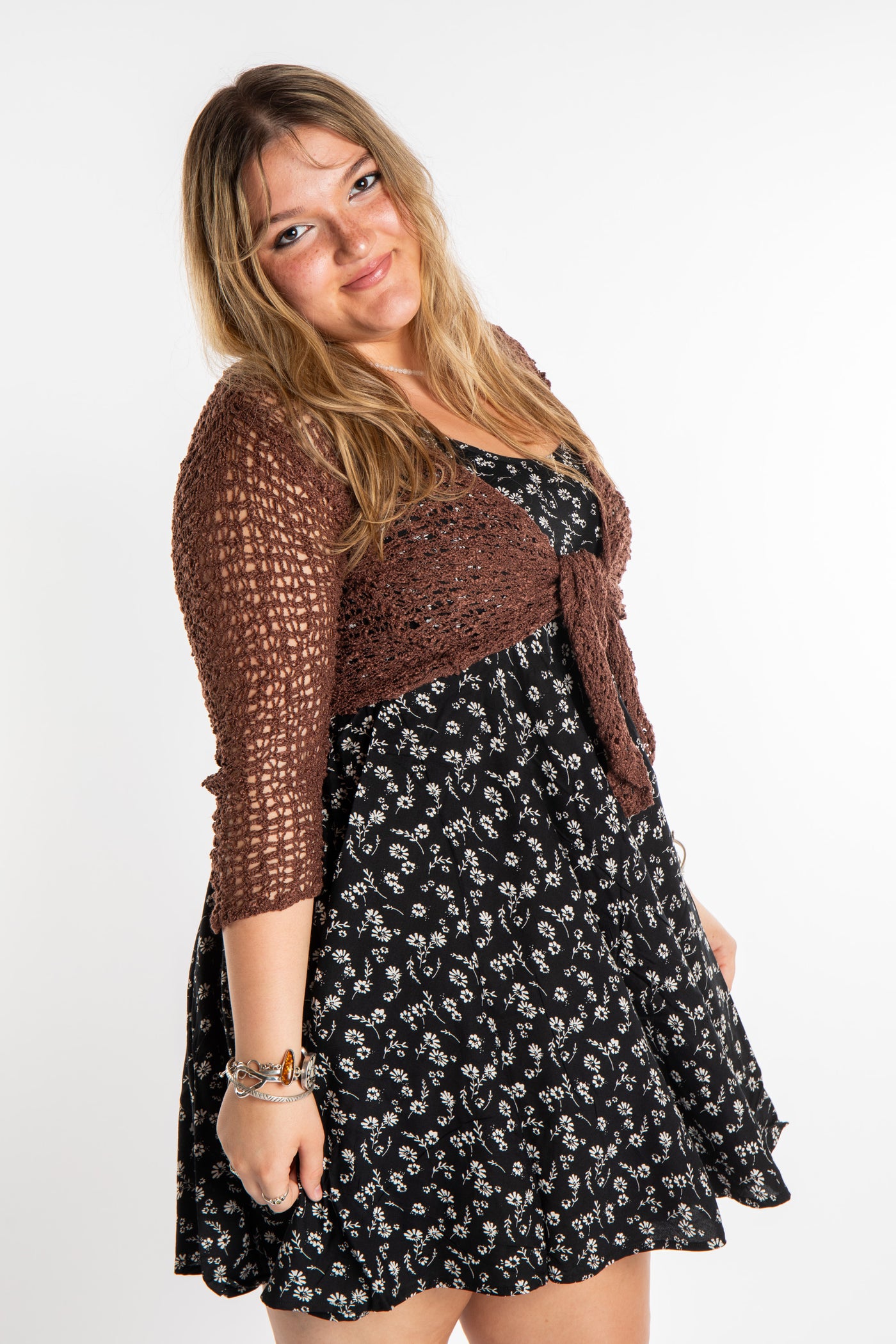 Emma is wearing the Brown loose knit cardigan