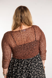 Emma is wearing the Brown loose knit cardigan