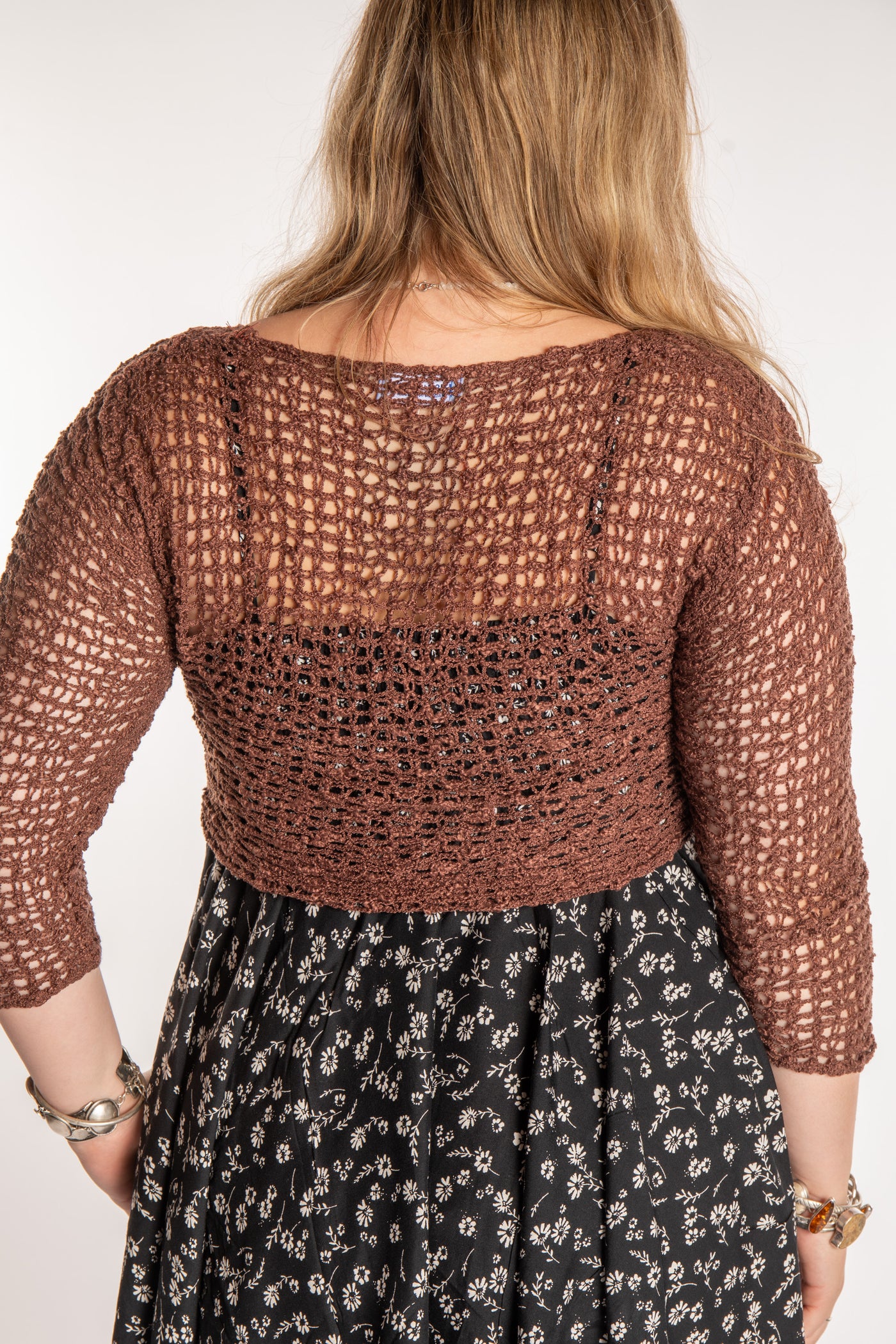 Emma is wearing the Brown loose knit cardigan