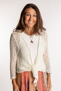 Jen is wearing the Ivory loose knit cardigan