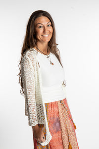 Jen is wearing the Ivory loose knit cardigan