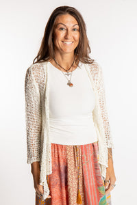 Jen is wearing the Ivory loose knit cardigan