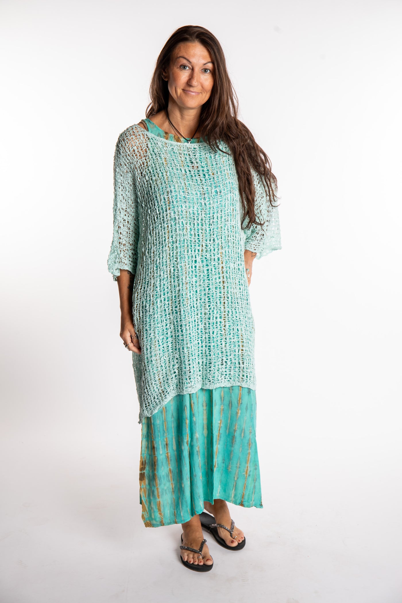 Jen is wearing the Seafoam loose knit cover up