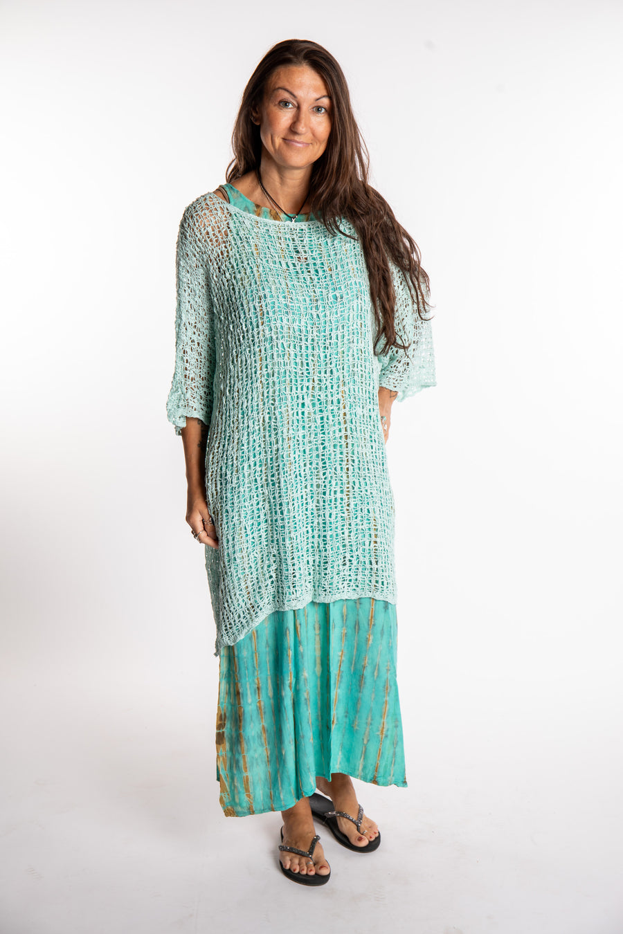 Jen is wearing the Seafoam loose knit cover up