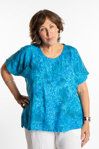 Betty is wearing a size Large batik tunic in Pacific