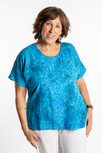 Betty is wearing a size Large batik tunic in Pacific