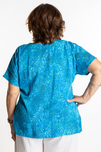 Betty is wearing a size Large batik tunic in Pacific