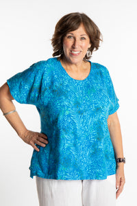 Betty is wearing a size Large batik tunic in Pacific