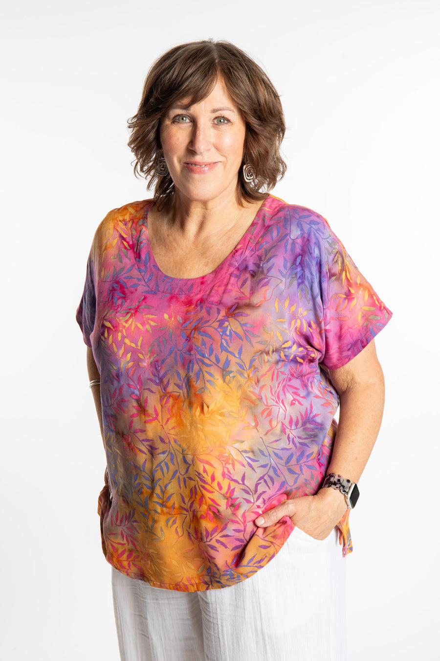 Betty is wearing a size Large batik tunic in Watermelon