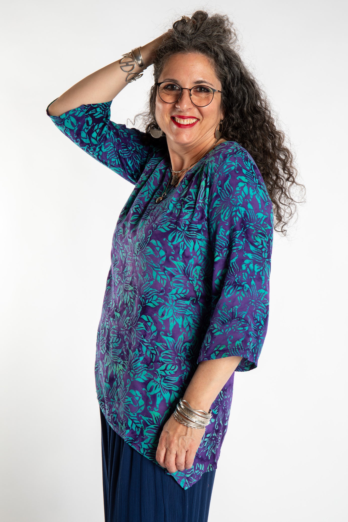 Susan wearing the M/L Blue Violet floral batik tunic top