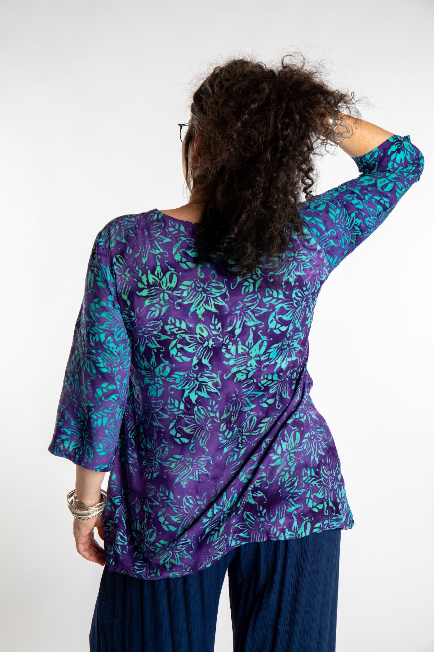 Susan wearing the M/L Blue Violet floral batik tunic top