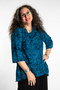Susan wearing the M/L Deep Azure blue floral batik tunic top