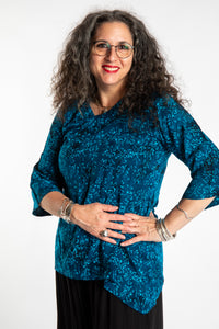 Susan wearing the M/L Deep Azure blue floral batik tunic top