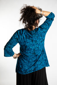 Susan wearing the M/L Deep Azure blue floral batik tunic top
