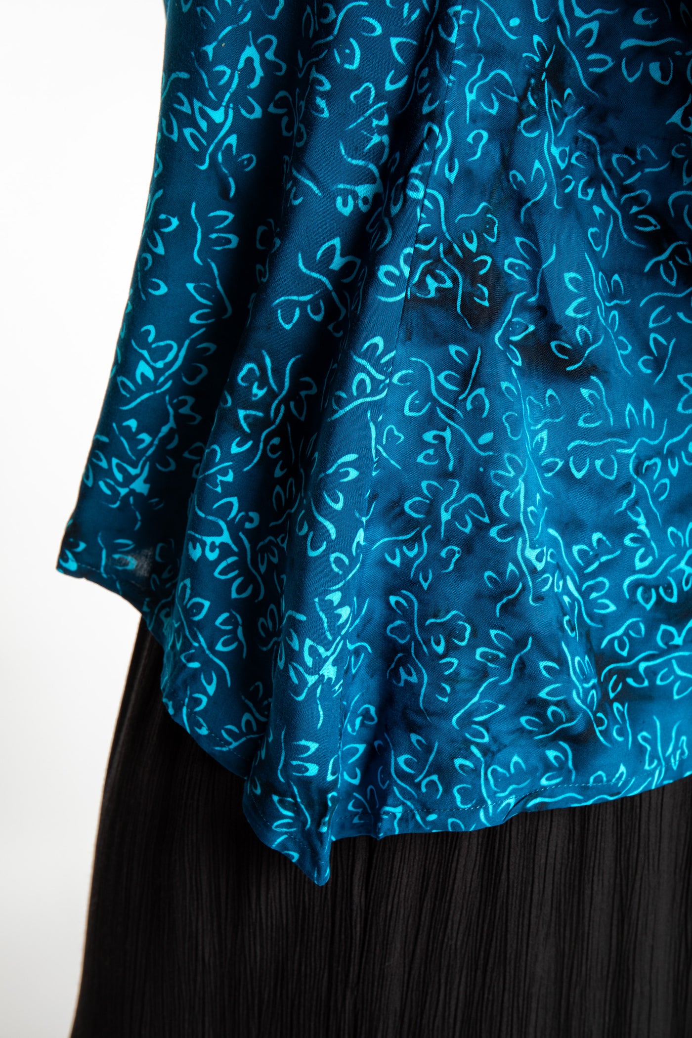 Susan wearing the M/L Deep Azure blue floral batik tunic top