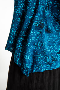 Susan wearing the M/L Deep Azure blue floral batik tunic top