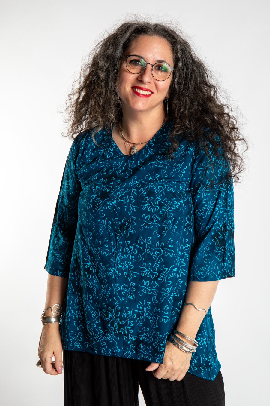 Susan wearing the M/L Deep Azure blue floral batik tunic top