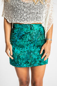 Sophie is wearing the Deep Sea Blue Juna Batik Pencil Skirt in size S/M