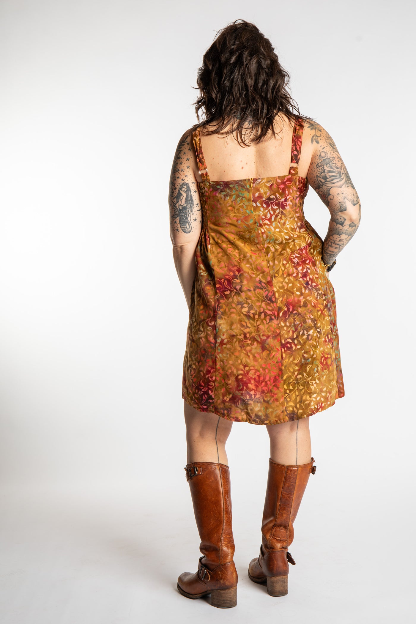 Morgan is wearing the Amber Surya Batik Sundress in size M 
