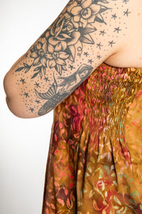 Morgan is wearing the Amber Surya Batik Sundress in size M 