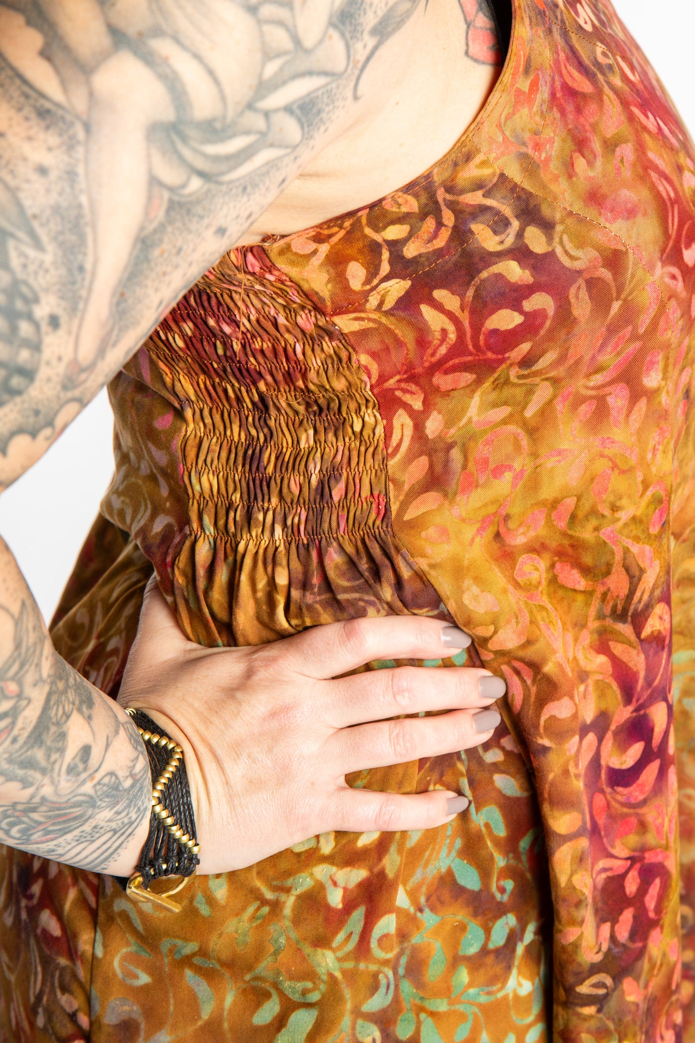 Morgan is wearing the Amber Surya Batik Sundress in size M 