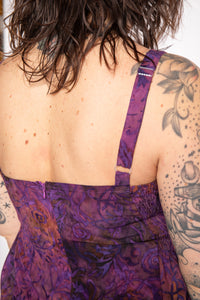 Morgan is wearing the Purple Paradise Surya Batik Sundress in size M 