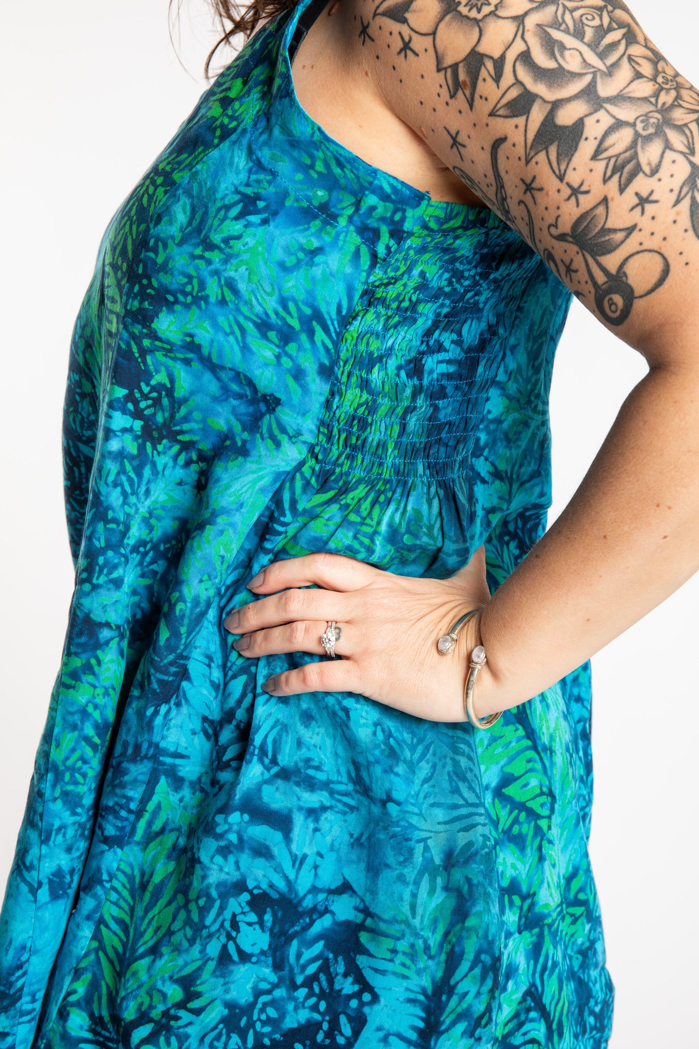 Morgan is wearing the Blue Undersea Surya Batik Sundress in size M 