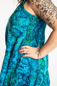 Morgan is wearing the Blue Undersea Surya Batik Sundress in size M 