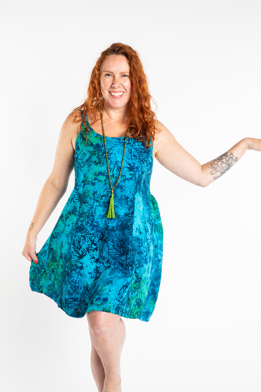 Maggie is wearing the M Blue Undersea Surya Batik Sundress