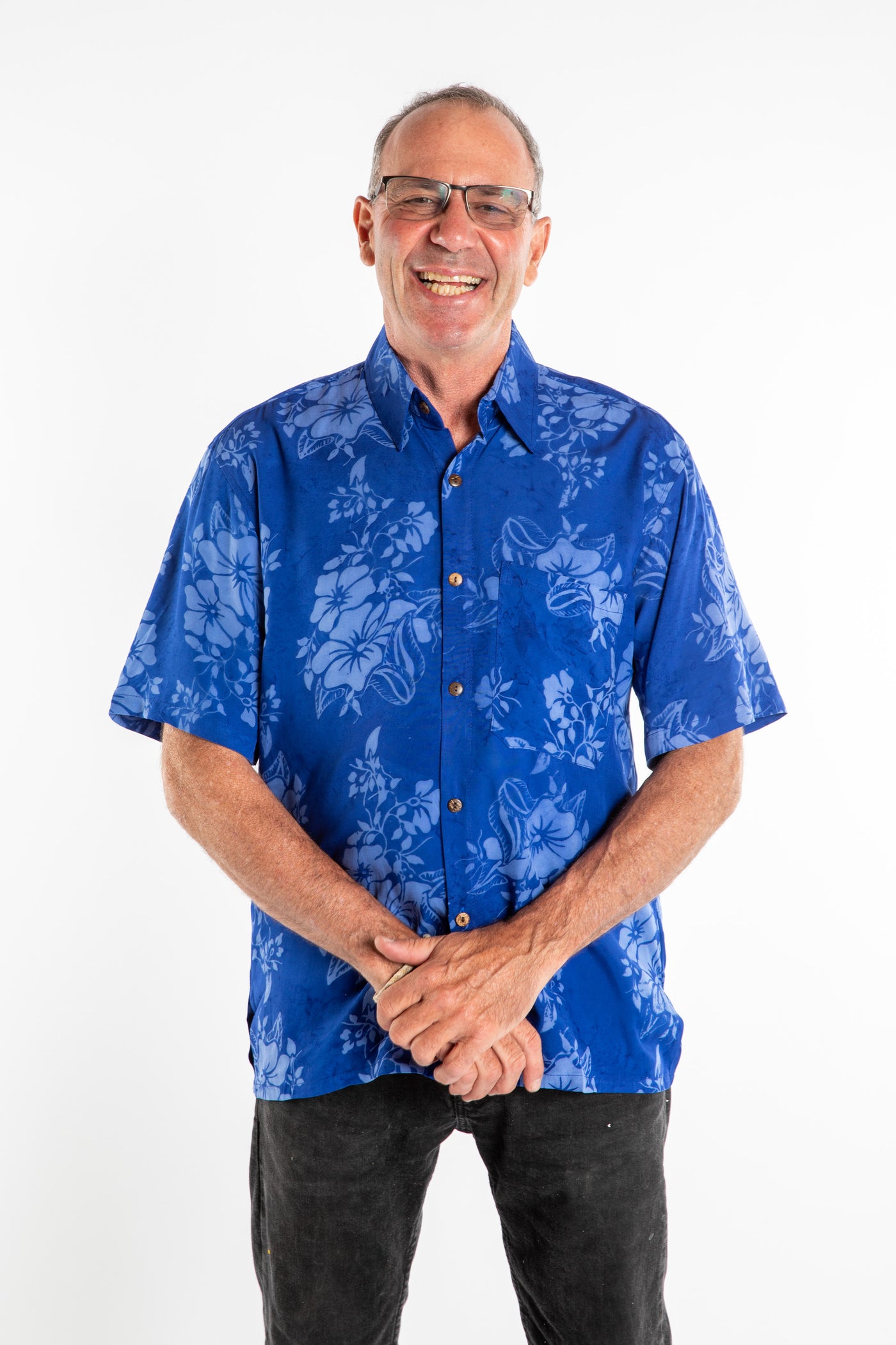 Ross wearing a M blue floral batik shirt in Cobalt