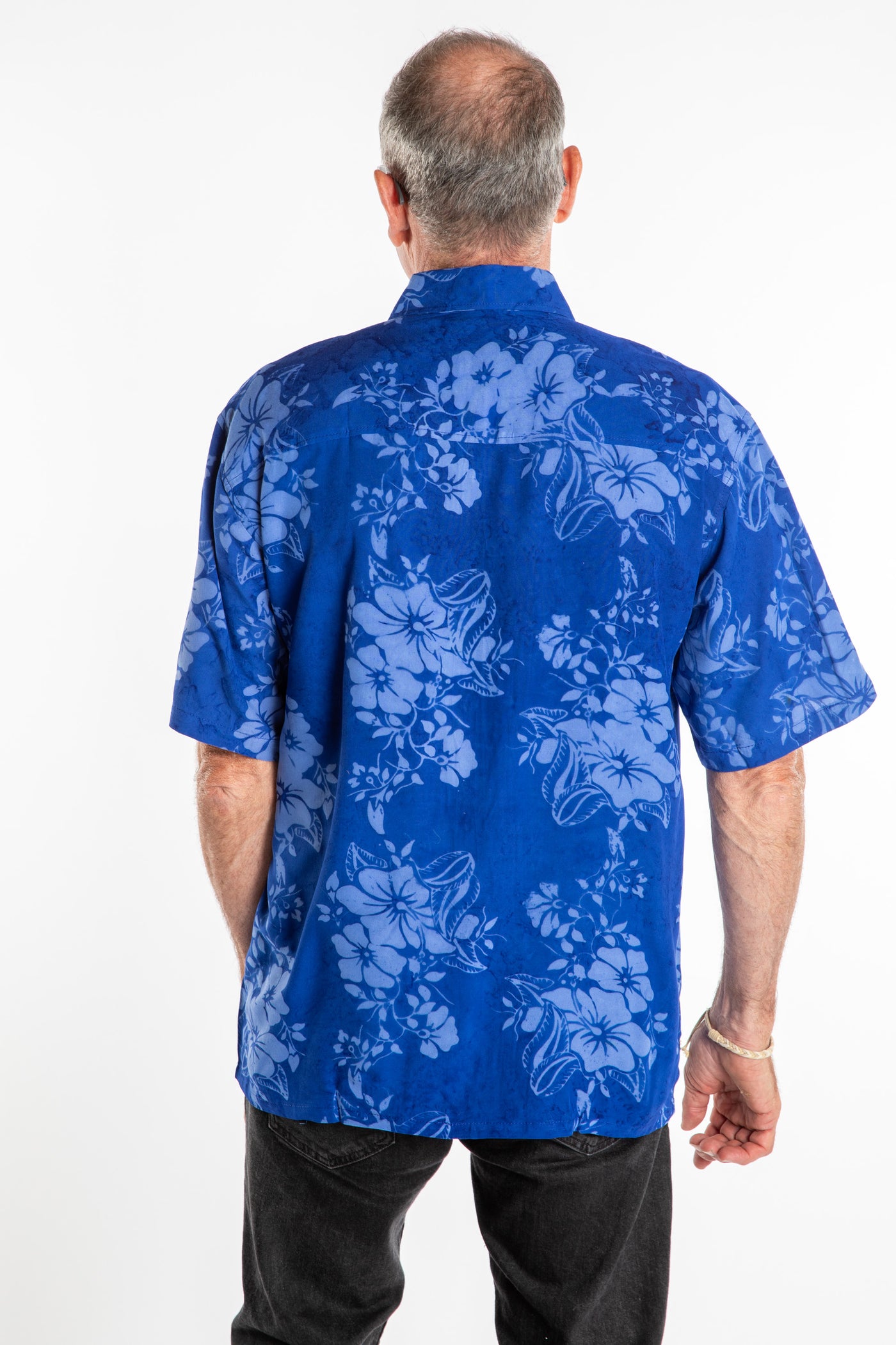 Ross wearing a M blue floral batik shirt in Cobalt