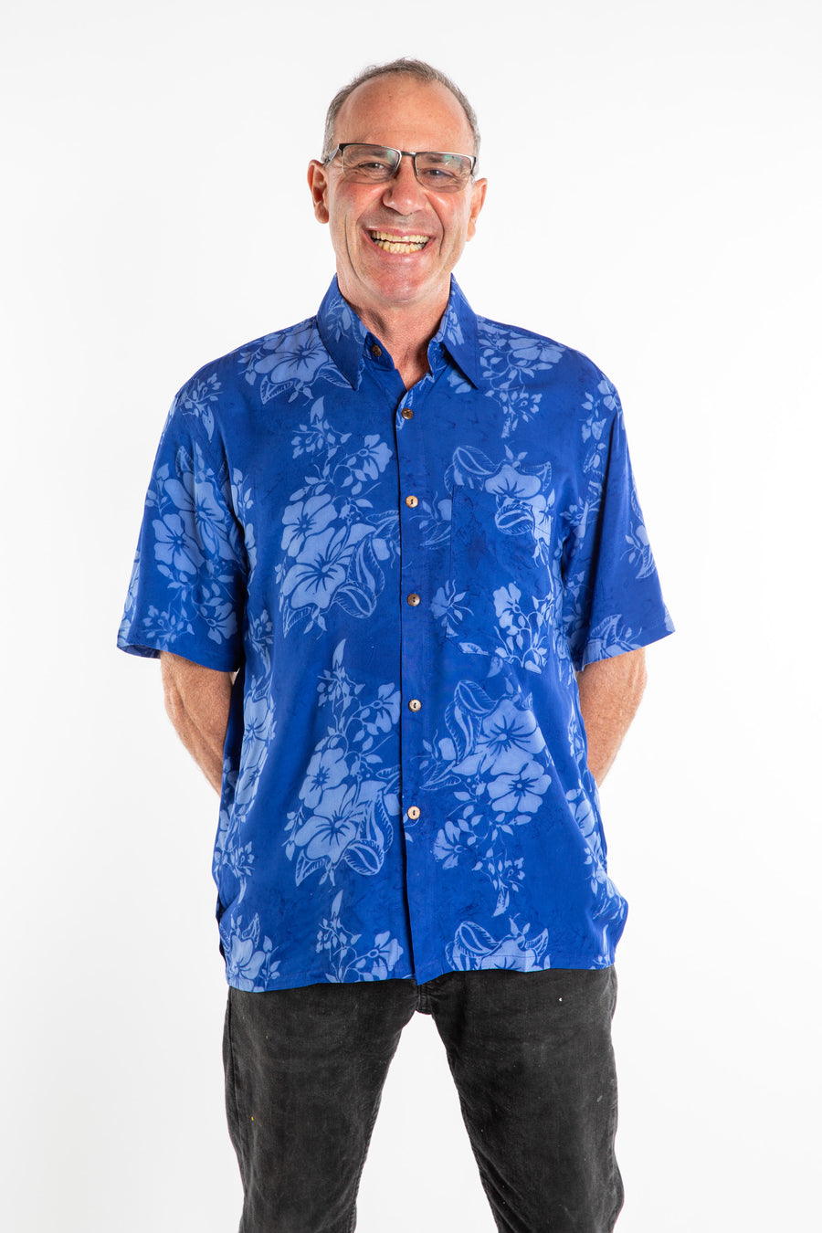 Ross wearing a M blue floral batik shirt in Cobalt