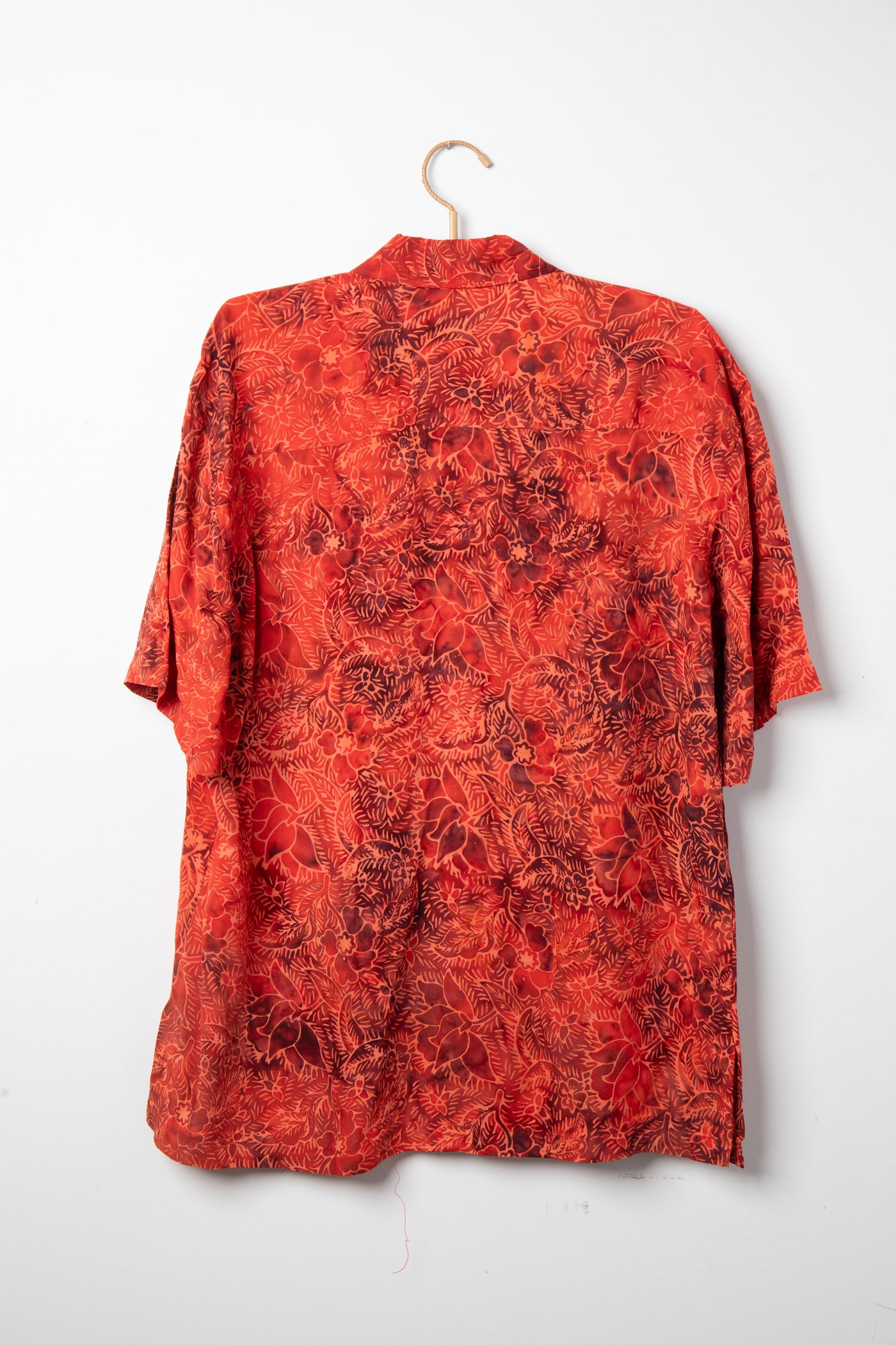 Red patterned batik shirt in Persimmon
