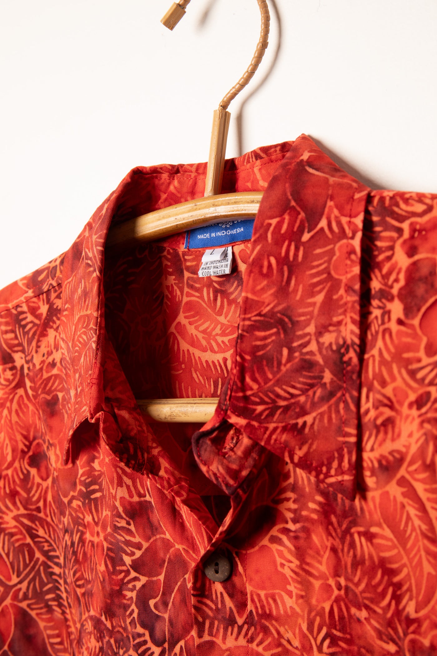 Red patterned batik shirt in Persimmon
