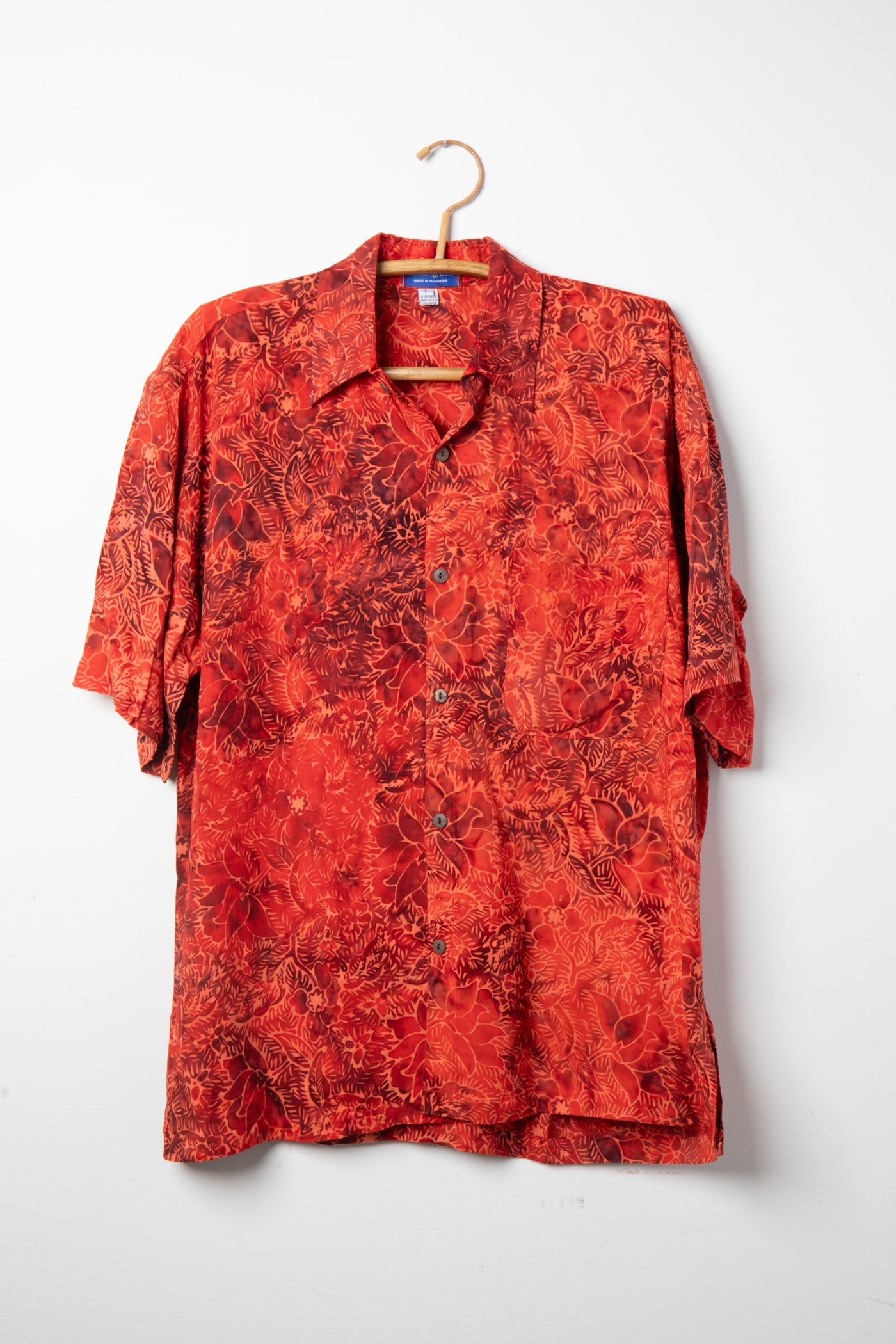 Red patterned batik shirt in Persimmon