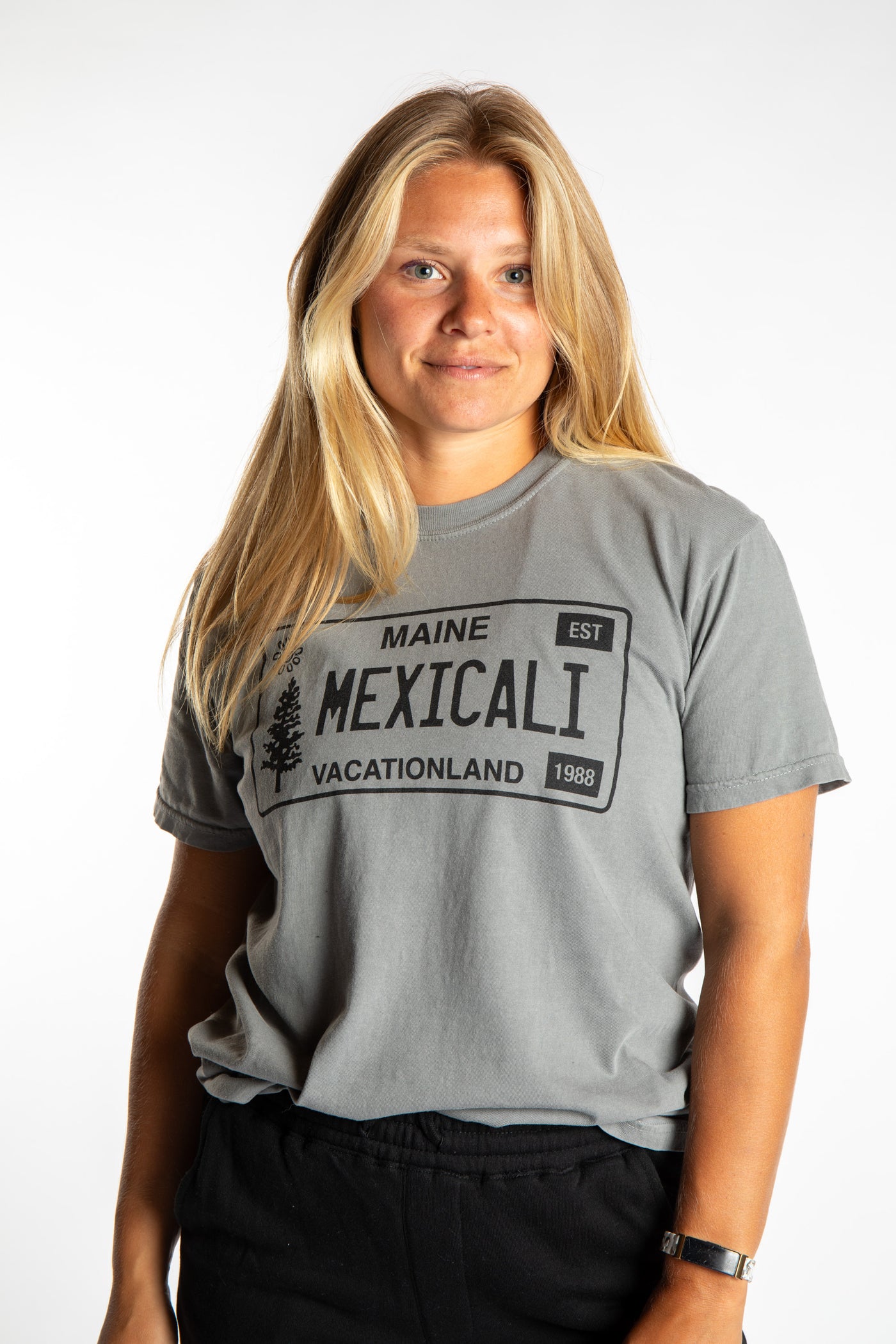 Sophie wearing size S Heather Sport Gray Mexicali License Plate T Shirt