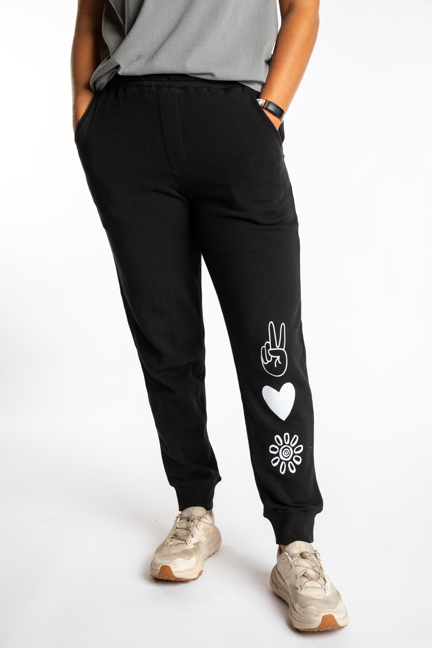 Sophie is wearing size S black Peace, Love, Mexicali jogger sweatpants
