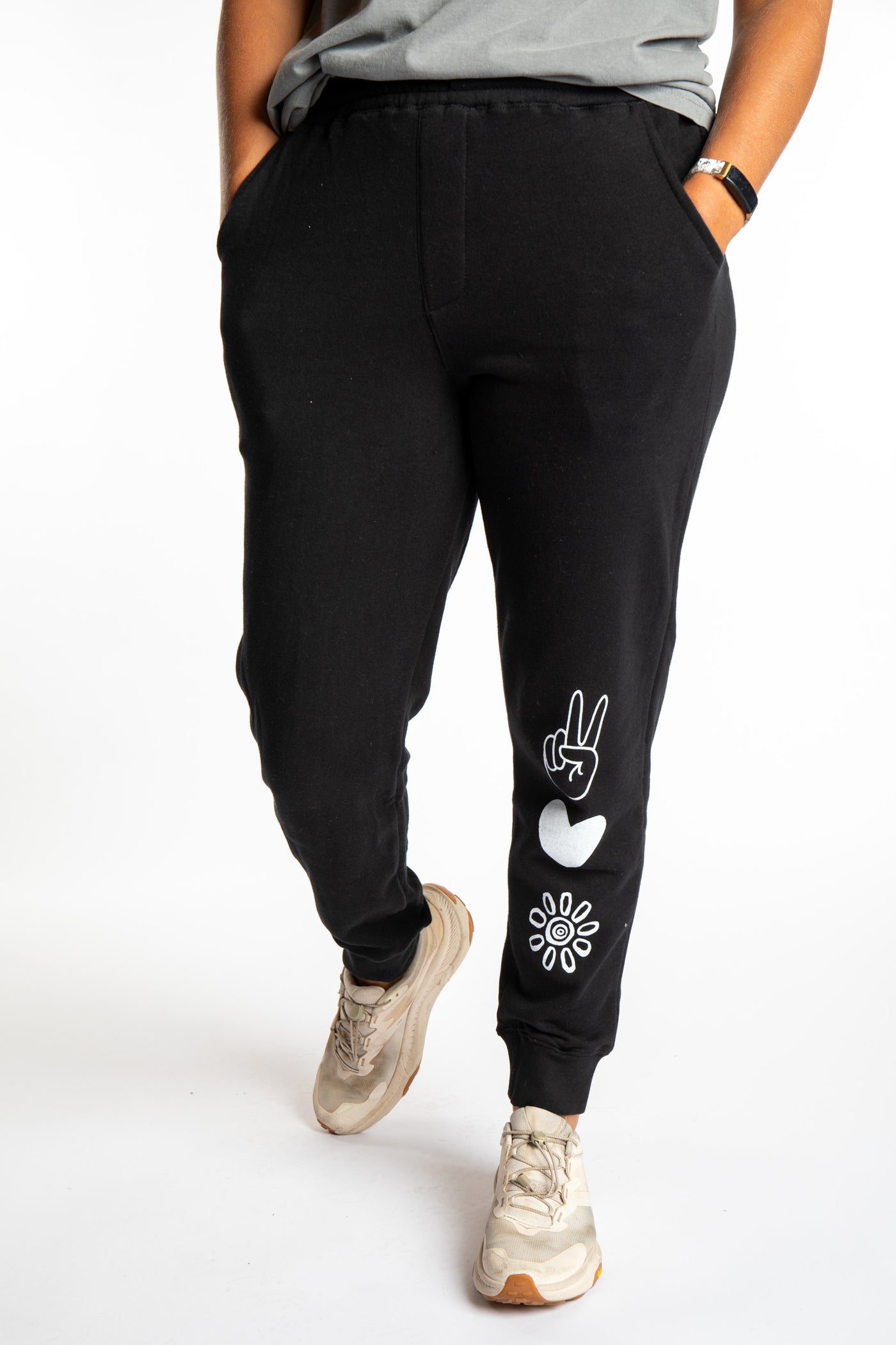 Sophie is wearing size S black Peace, Love, Mexicali jogger sweatpants