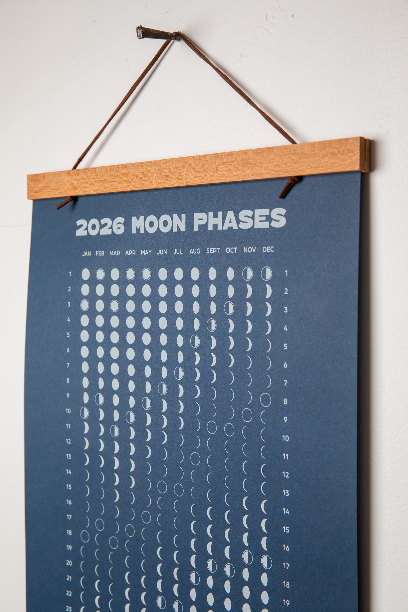 Magnetic Calendar Hanging Frame holding 2026 Moon Phase Calendar
