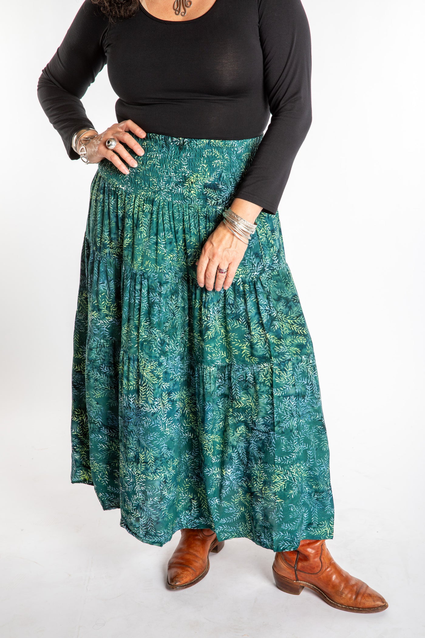 Susan wearing a S/M colorful patterned batik skirt in Forest Green