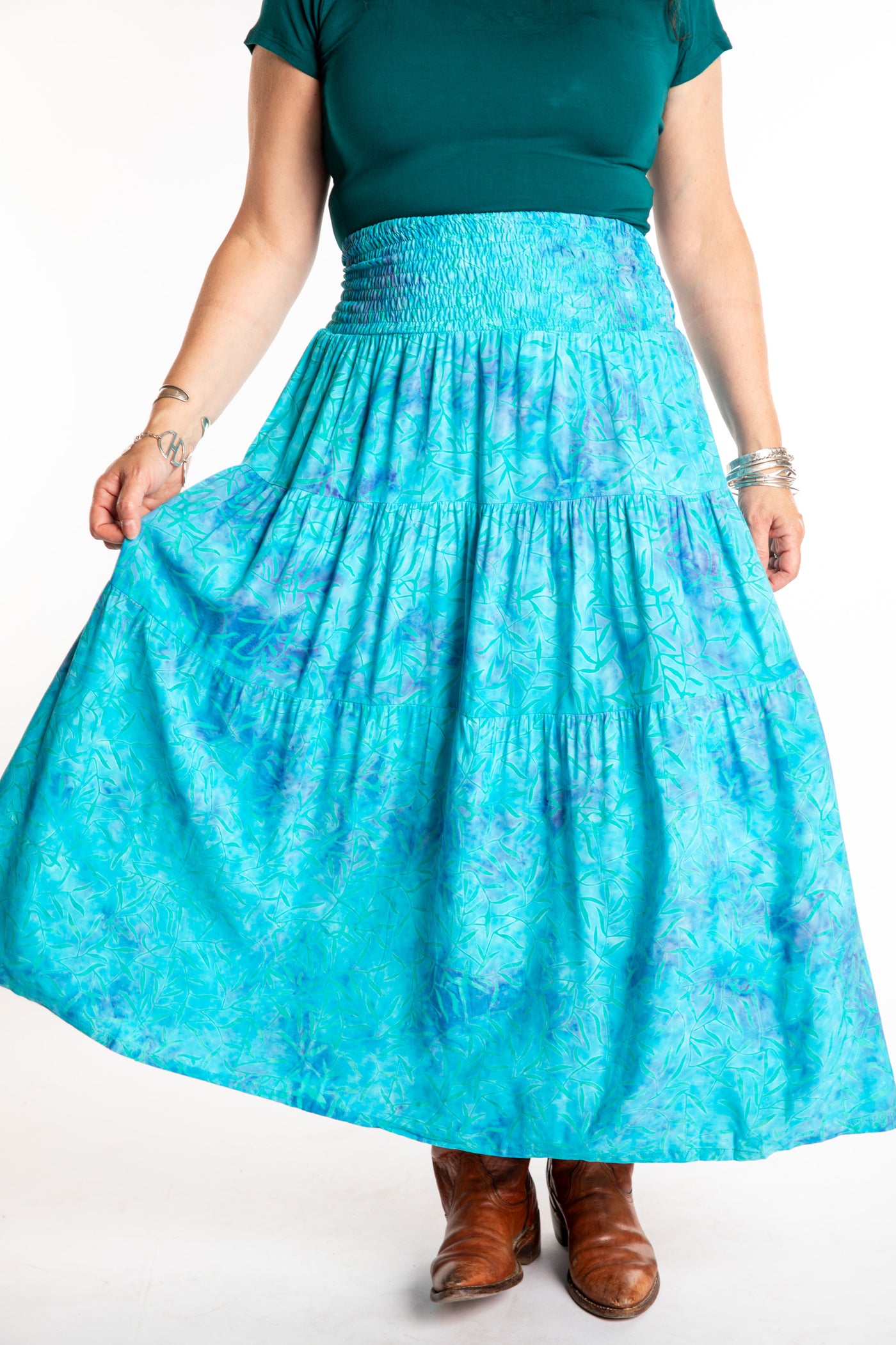 Susan wearing a S/M colorful patterned batik prairie skirt in Sky Blue
