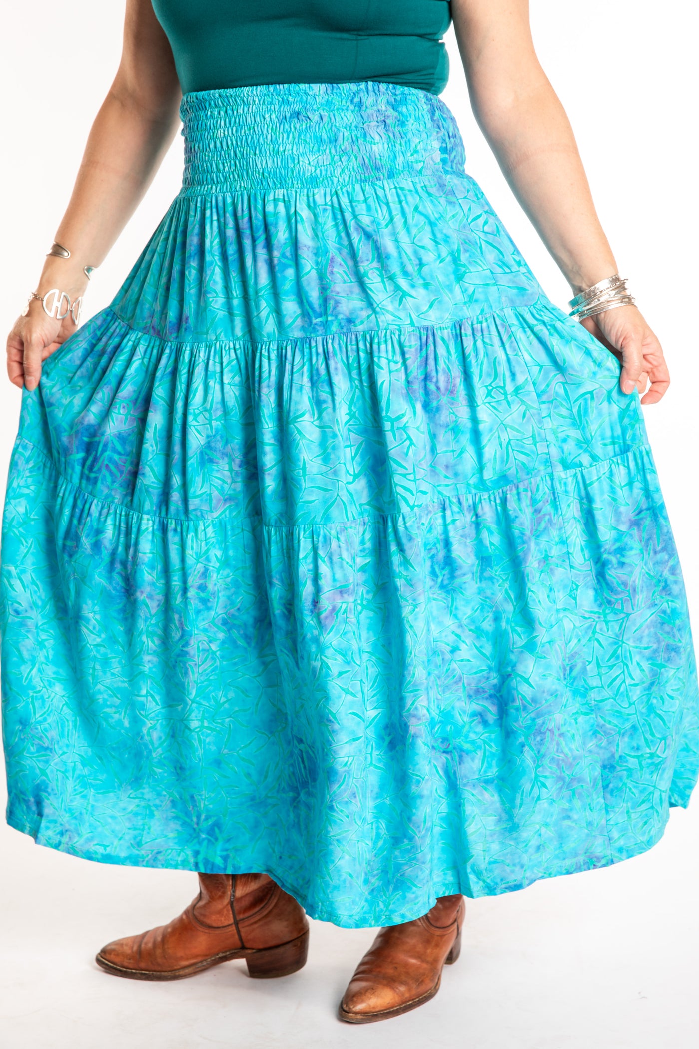 Susan wearing a S/M colorful patterned batik prairie skirt in Sky Blue