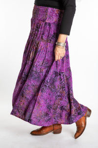Susan wearing a S/M colorful patterned batik prairie skirt in Violet