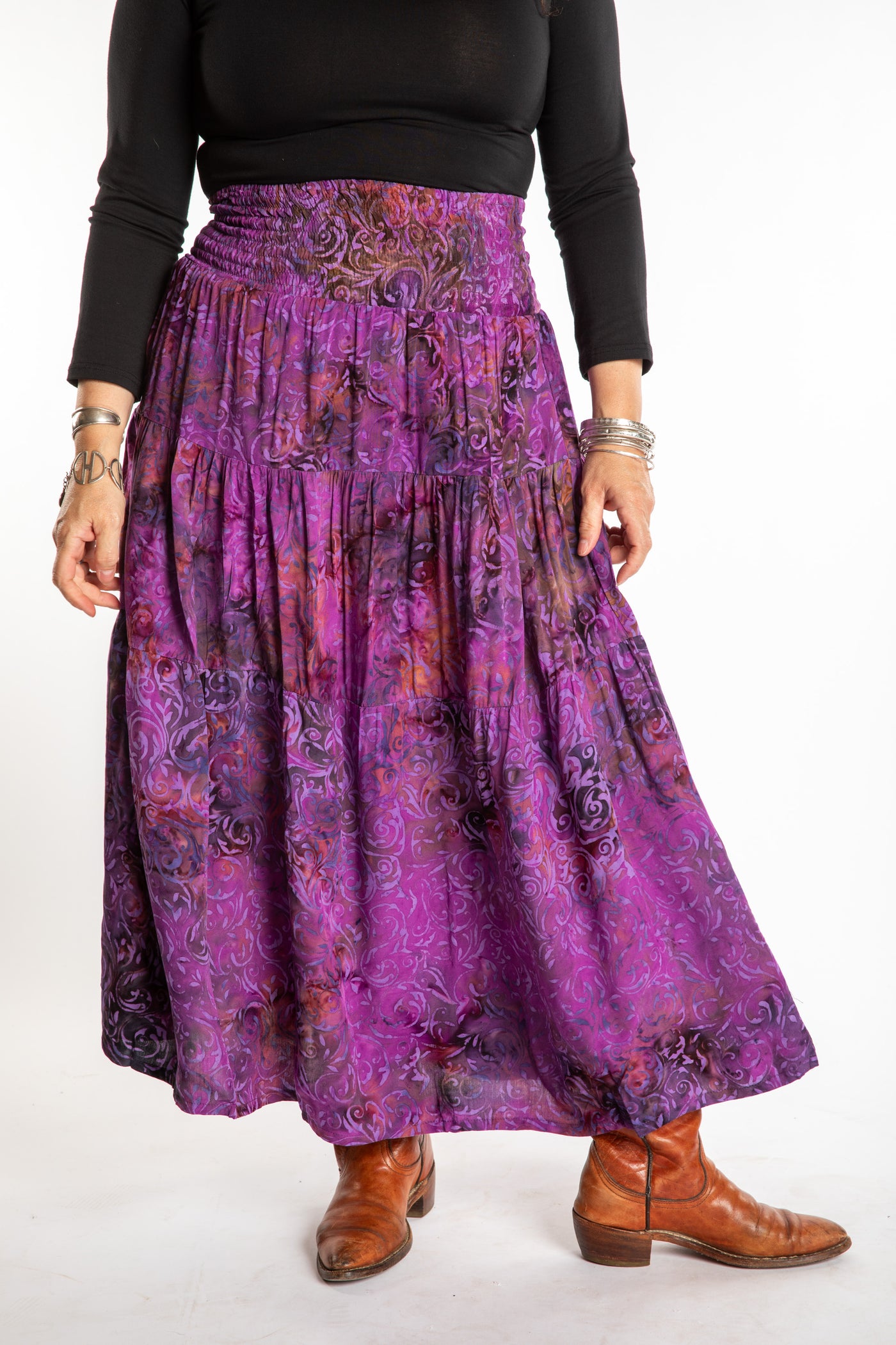 Susan wearing a S/M colorful patterned batik prairie skirt in Violet