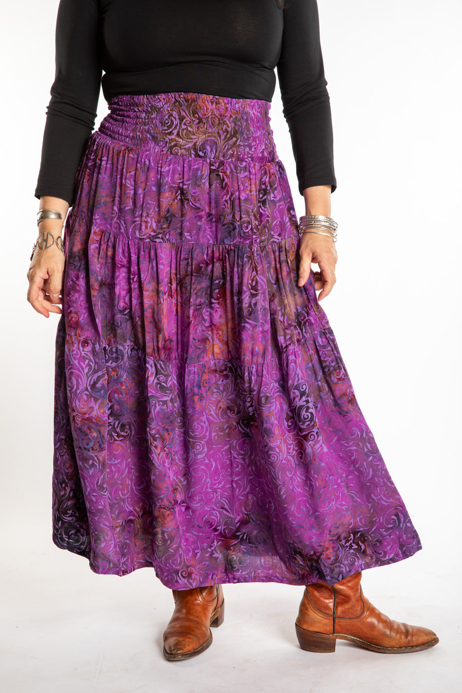 Susan wearing a S/M colorful patterned batik prairie skirt in Violet