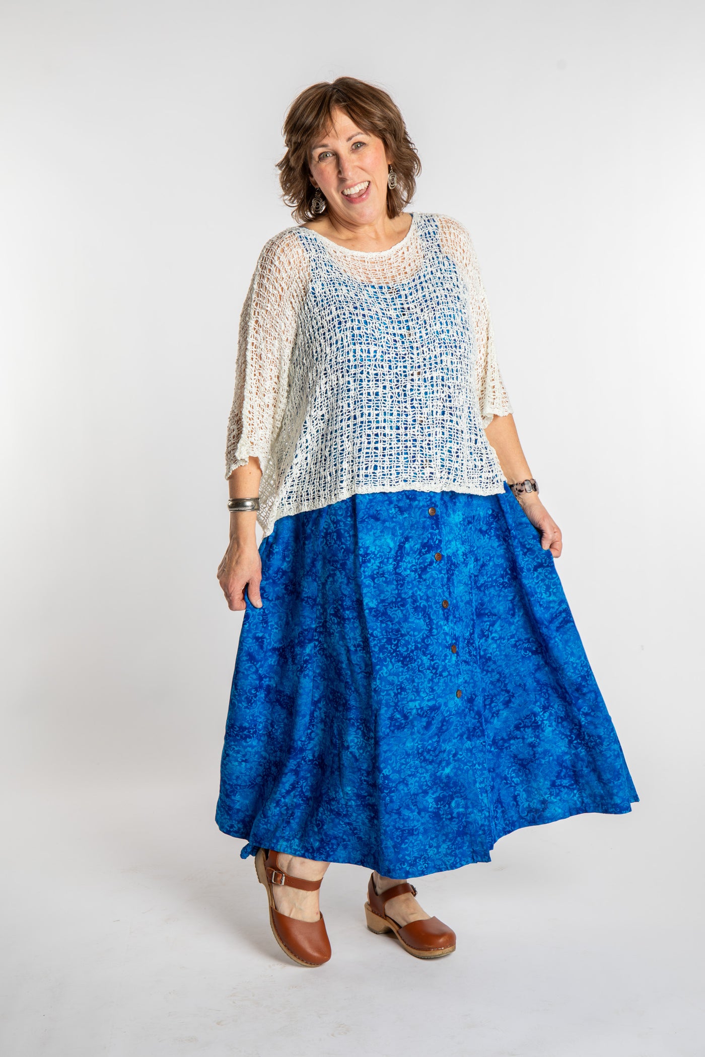 Betty is wearing the Cobalt Blue Ani Button Batik Maxi Dress in size L