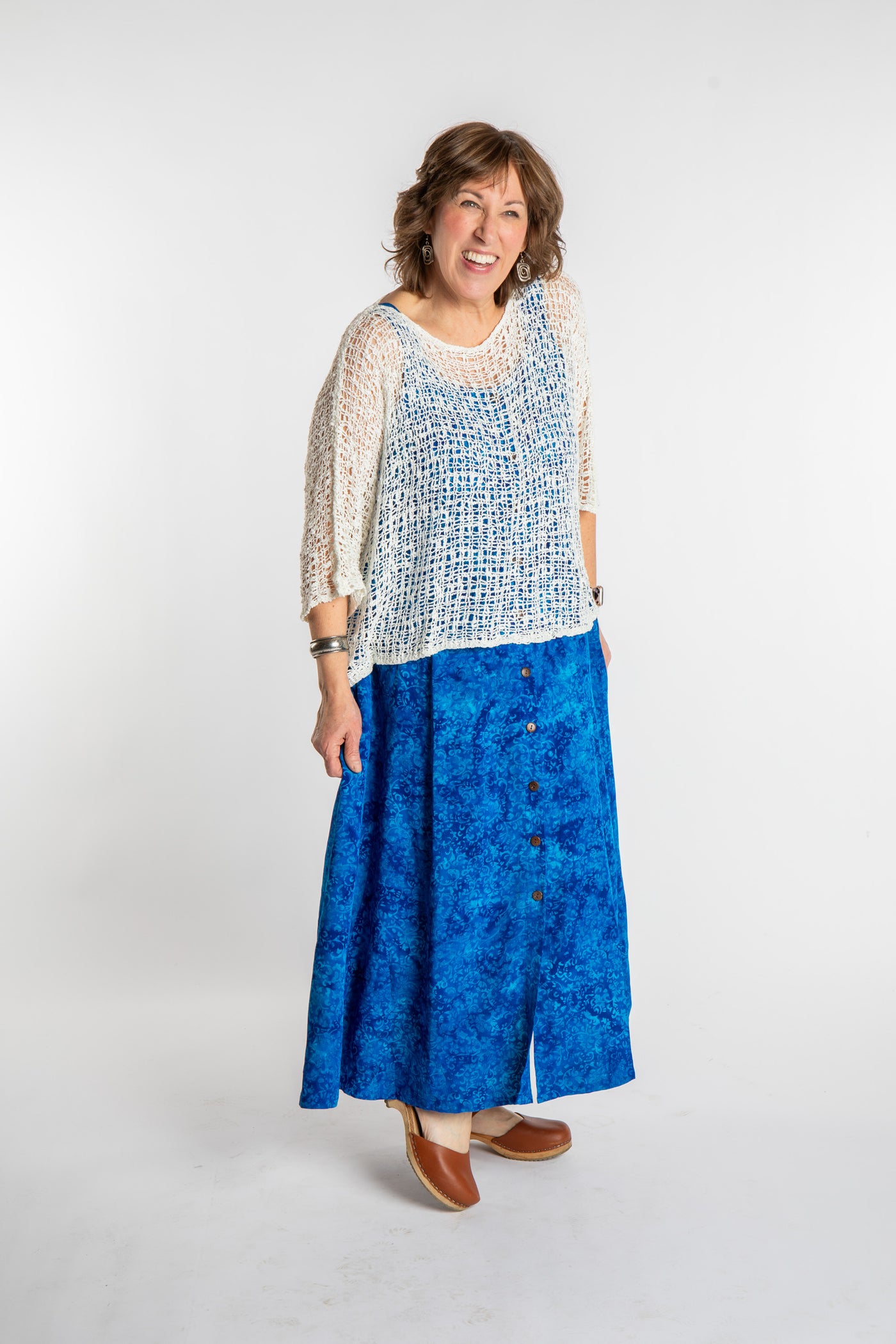 Betty is wearing the Cobalt Blue Ani Button Batik Maxi Dress in size L