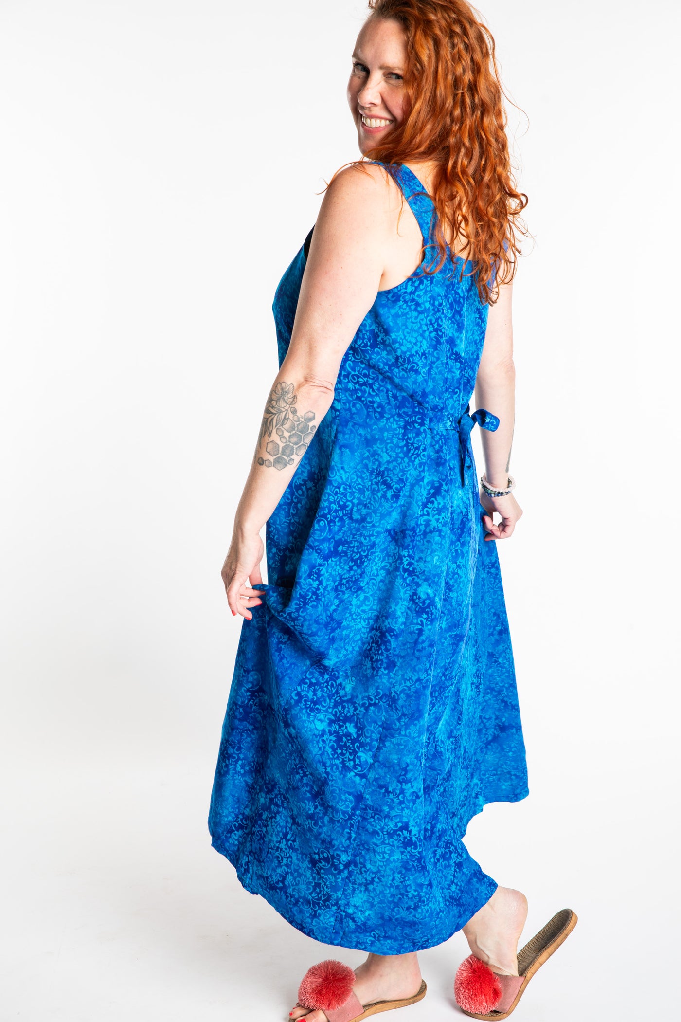 Maggie is wearing the Large Blue Cobalt Ani Button Batik Maxi Dress